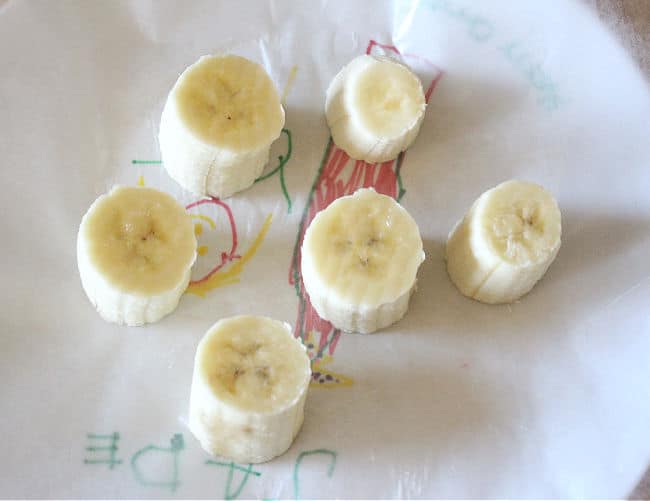 Cut bananas on a plate.