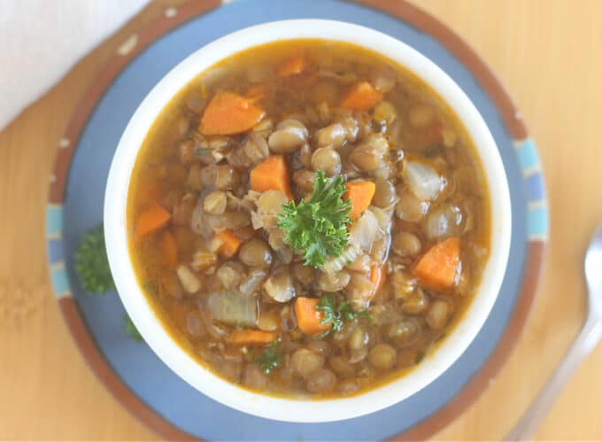 Top down view of lentil and vegetable soup.