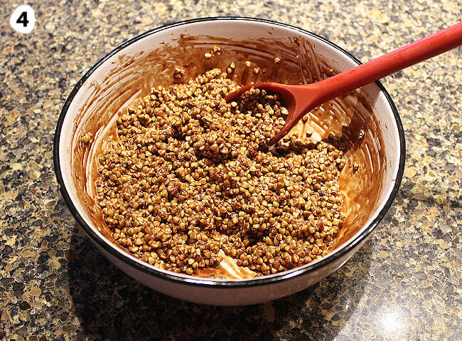 Mixing ingredients for chocolate buckwheat granola.
