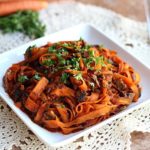 Carrot noodles mixed with marinara sauce