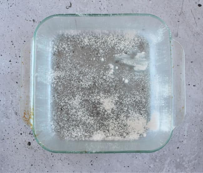 Glass pan that has been oiled and floured.