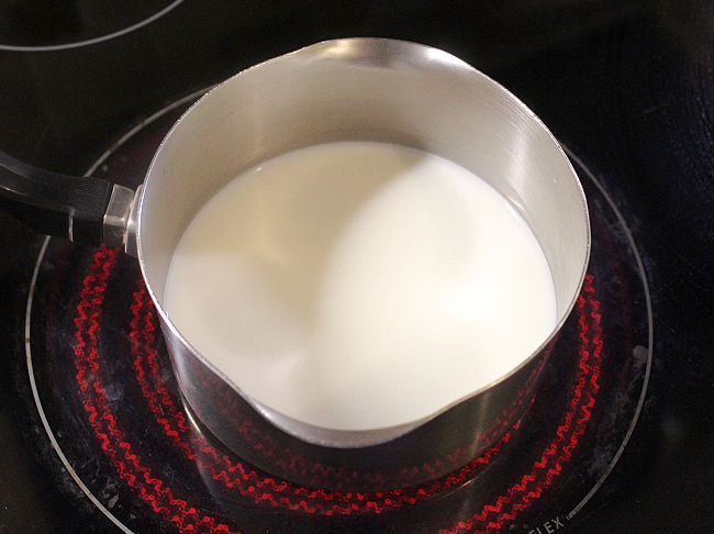 Milk in a saucepan on the stove.