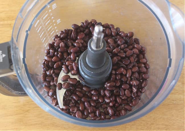 Black beans in a food processor.