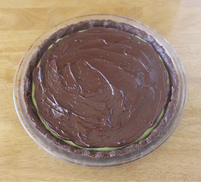 Chocolate spread atop a pie.