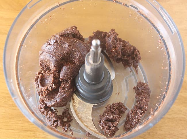 Chocolate dough in a food processor.
