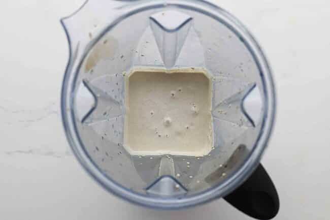 Blended quinoa and water in a blender.
