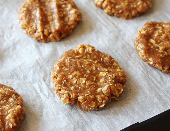 Pre-baked cookie on a baking sheet.