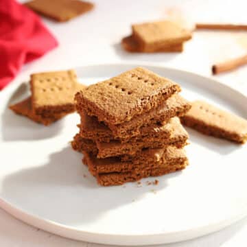 Hard light photo of a stack of homemade graham crackers.