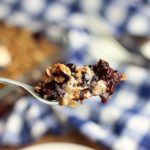 Lighter blueberry crisp recipe on a fork.