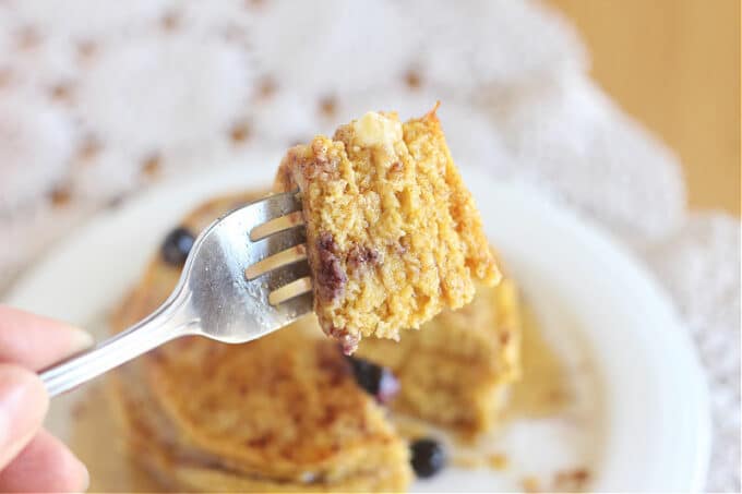 Large bite of pancake on a fork.