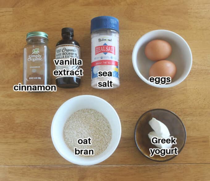 Ingredients laid out on a table, including oat bran and eggs.