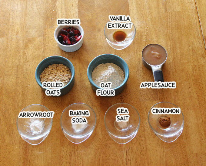 Ingredients for recipe laid out on a wood table.
