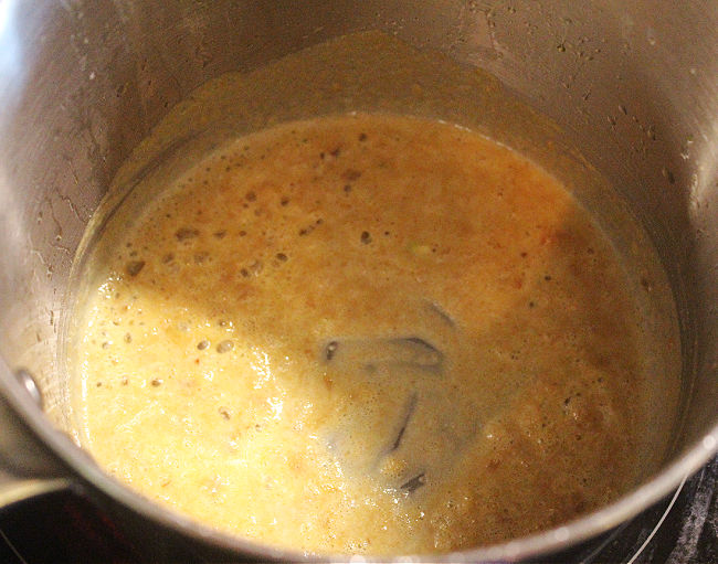 Flour cooking in oil in a saucepan.