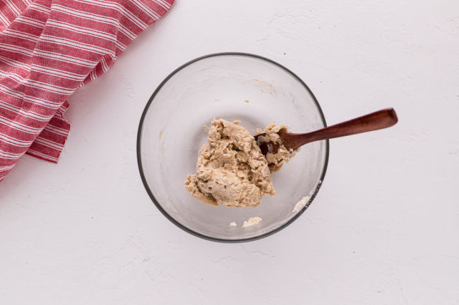 Pizza dough in a bowl.