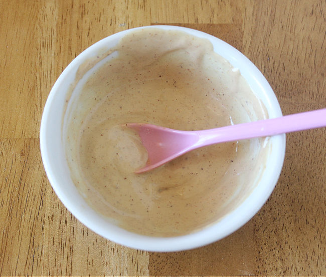 Peanut butter and milk mixture in a bowl.