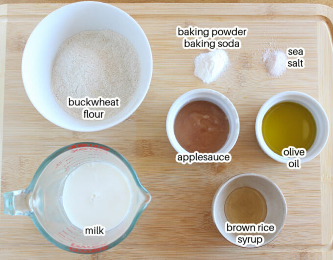 Ingredients for biscuits laid out on a table, including buckwheat flour.