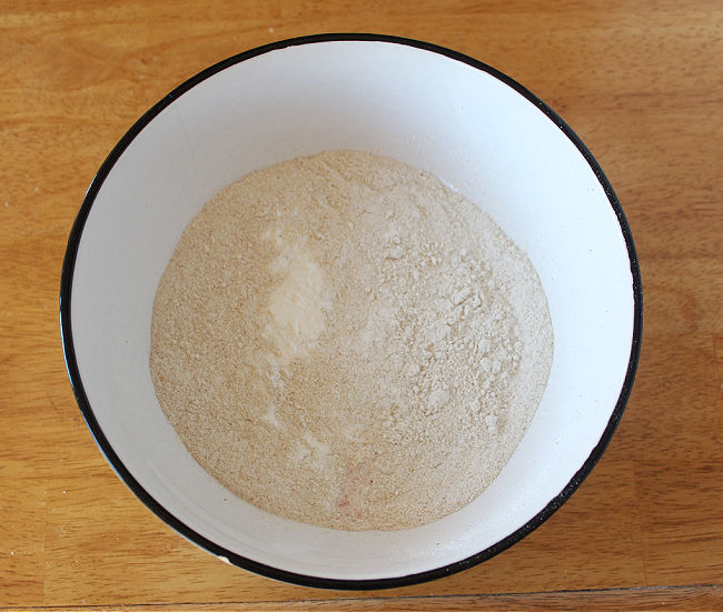 Flour in a white bowl.