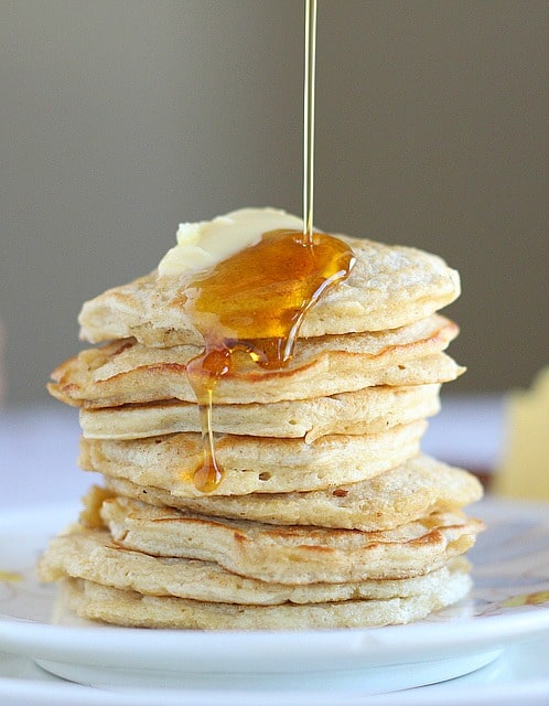 Stack of oatmeal pancakes high in protein.