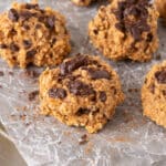 Baked chocolate chip cookies on a dish.