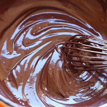 Healthy chocolate sauce being whisked in a bowl.