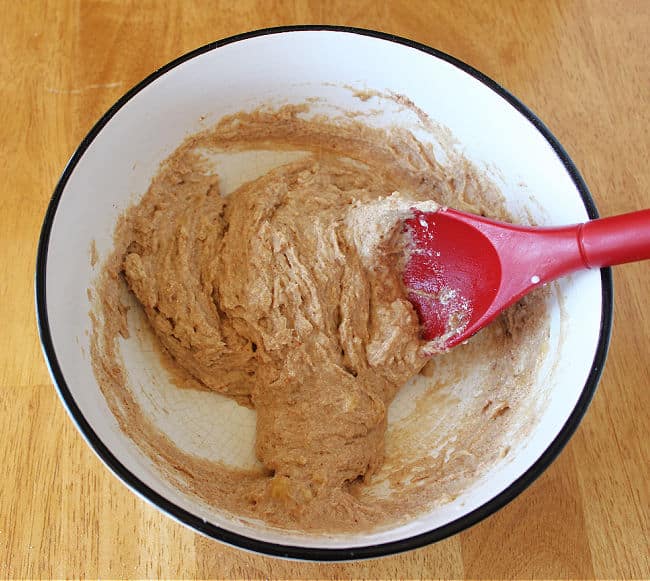 Cookie dough in a white bowl.