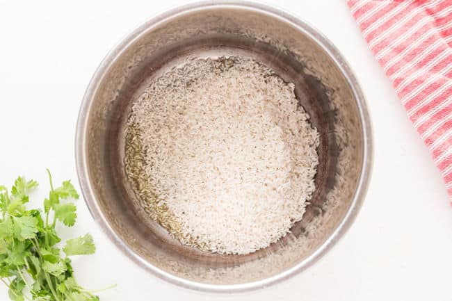 Uncooked white rice in an Instant Pot.