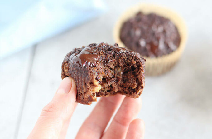 Half-eaten chocolate muffin.