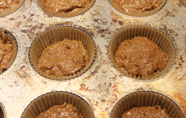 Chocolate muffins before being baked.