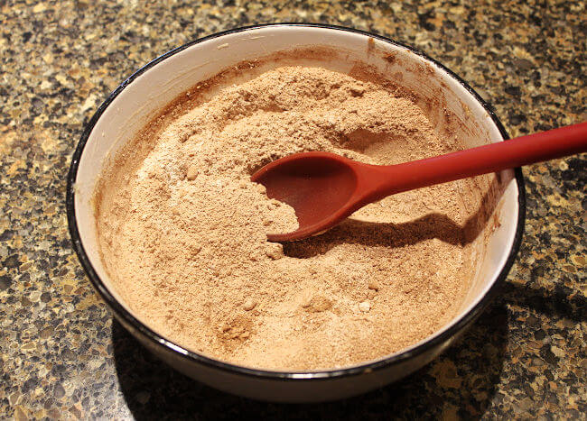 Dry ingredients for chocolate muffins in a bowl.