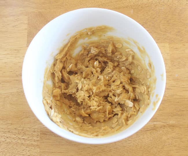 Cookie dough in a white bowl.