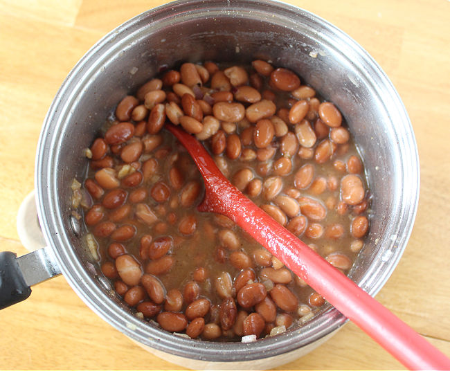 Saucepan full of pinto beans.