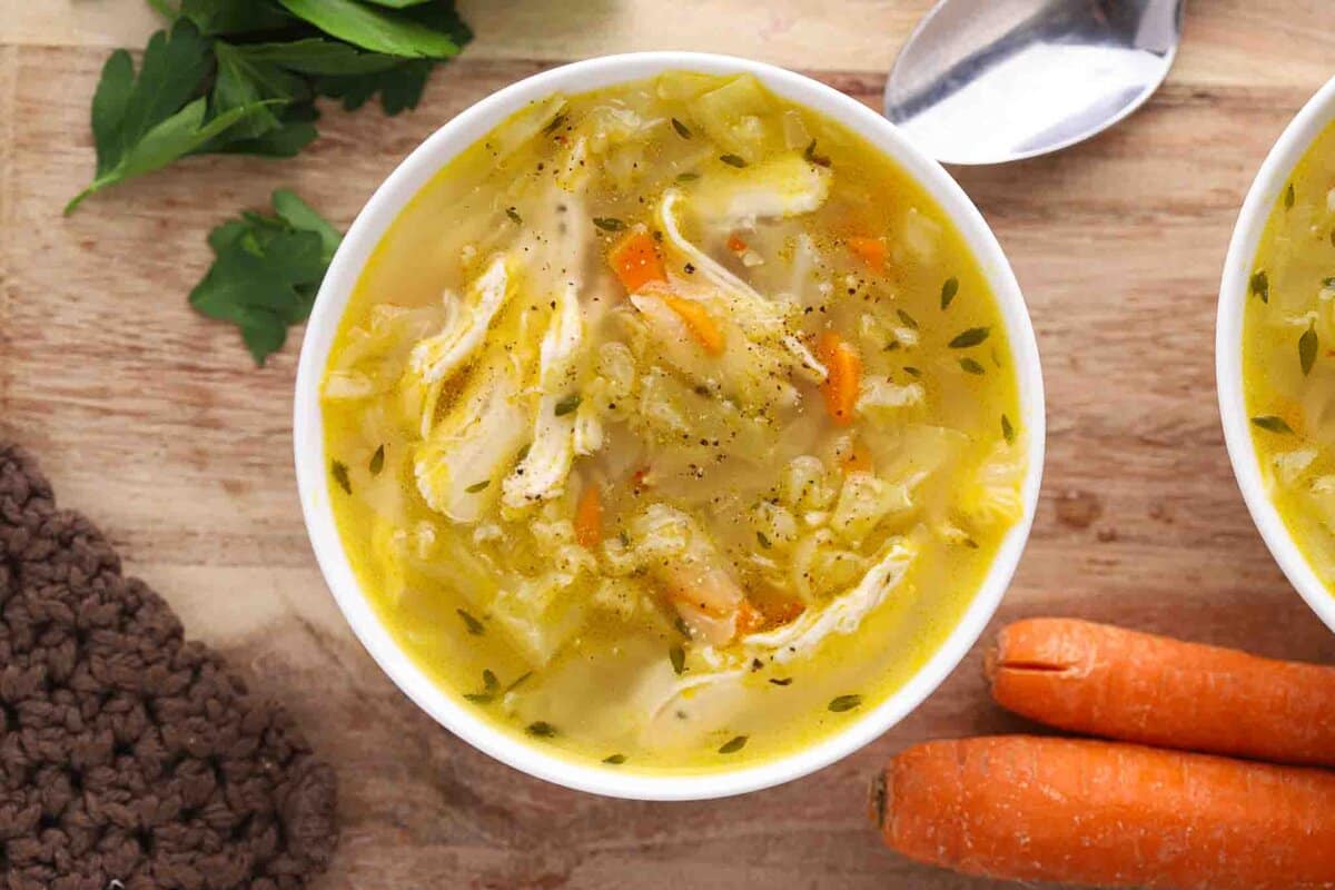 Bowl of chicken cabbage soup.