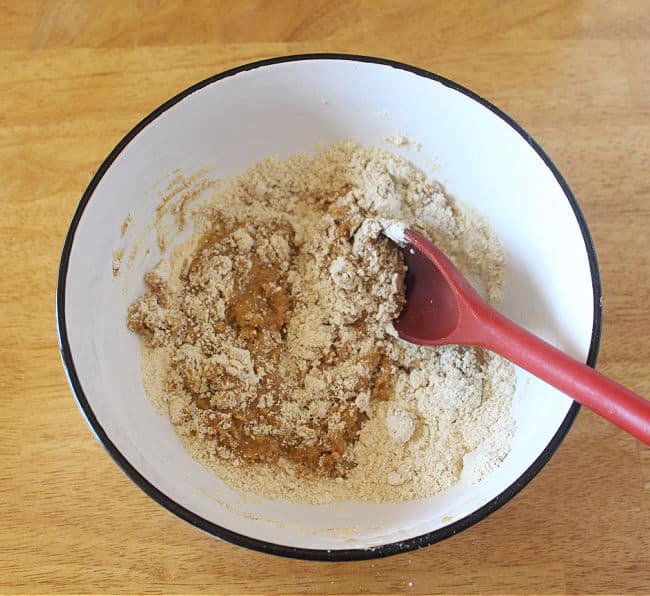 Flour, sugar, and oil in a large bowl.