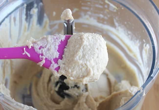 Blended hummus in a food processor.