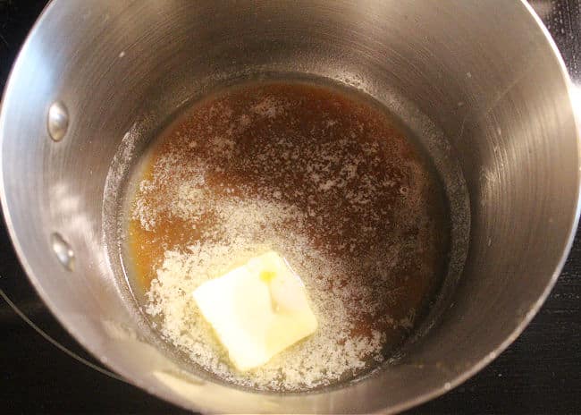 Butter and maple syrup in a saucepan.