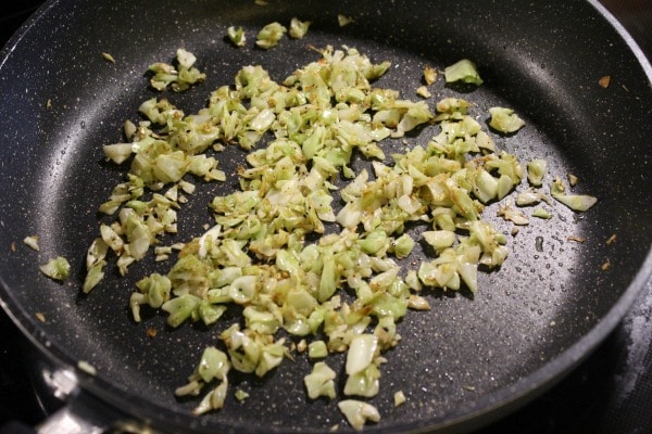 Cabbage and eggs in a pan