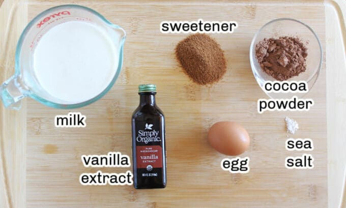 Ingredients for hot chocolate laid out on a table.