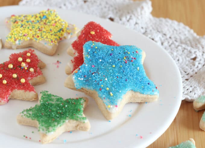 Christmas cookies on a white plate.