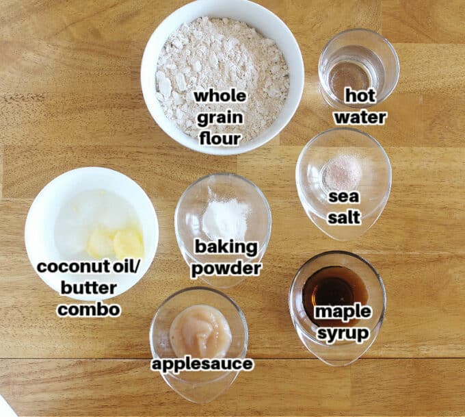 Ingredients for cookies laid out on a wood table.