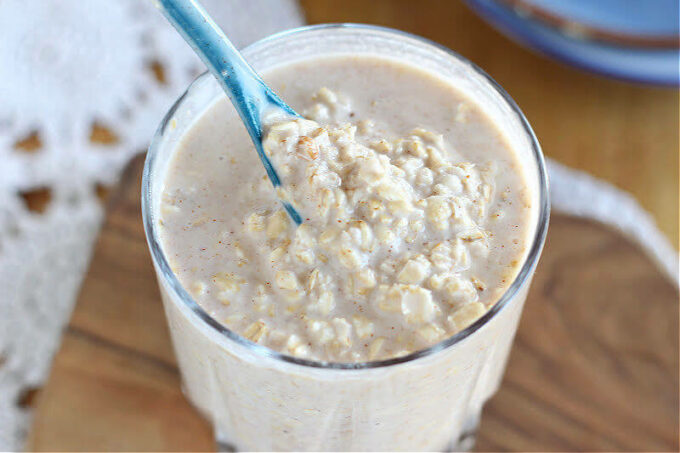 Spoonful of overnight oats with almond butter.