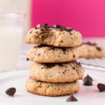 Stack of almond flour cookies on a white plate.