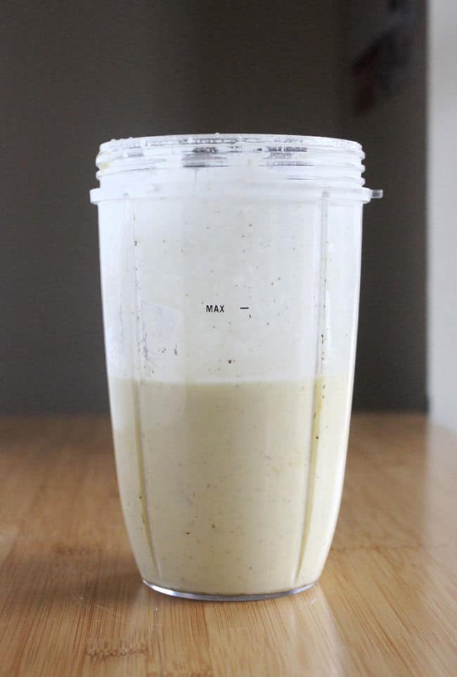 Blended salad dressing in a Nutritbullet blender.