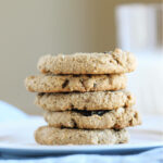 Stack of oatmeal raisin cookies on a plate.