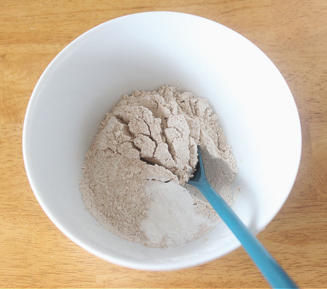 Flour in a white bowl.