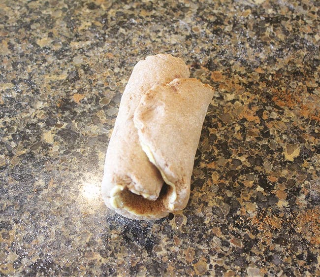 Rolled dough on a countertop.