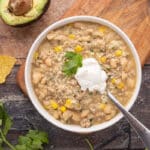 Turkey chili with sour cream and cilantro on top.