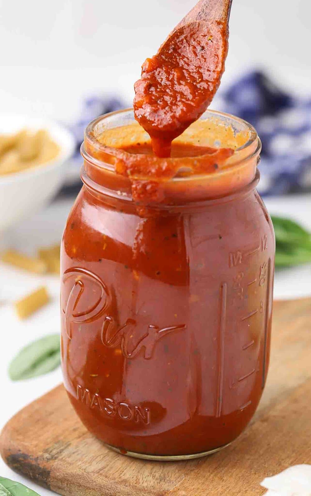 Homemade marinara sauce in a mason jar.