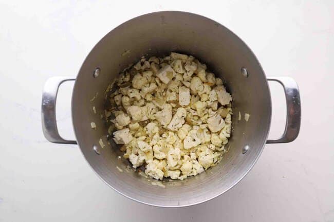 Raw cauliflower in a pot.