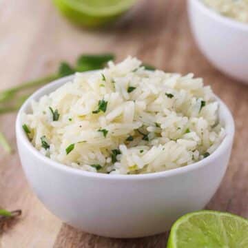 Rice with cilantro in a bowl.